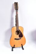 A YAMAHA DW7-12 ACOUSTIC GUITAR with solid spruce top , Kinsman stand and a Ritter case containing a
