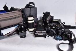 A TRAY CONTAINING FILM AND DIGITAL CAMERAS AND LENSES including a Minolta Dynax 7000i fitted with