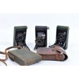 TWO BOY SCOUT KODAK AND ONE GIRL GUIDE KODAK FOLDING CAMERAS one with a green Boy Scout leather