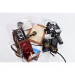 A MPP MICROCORD TLR CAMERA in leather case with manual, a Yashica T3 cine camera with manual , a