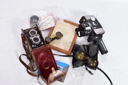A MPP MICROCORD TLR CAMERA in leather case with manual, a Yashica T3 cine camera with manual , a