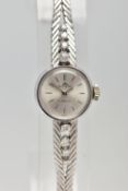 A MID 20TH CENTURY DIAMOND WHITE METAL MANUAL WIND WRISTWATCH, the circular silver tone dial, with