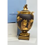 A BOXED WEDGWOOD MASTERPIECE COLLECTION LIMITED EDITION BLACK BASALT AND GILT PEGASUS VASE AND