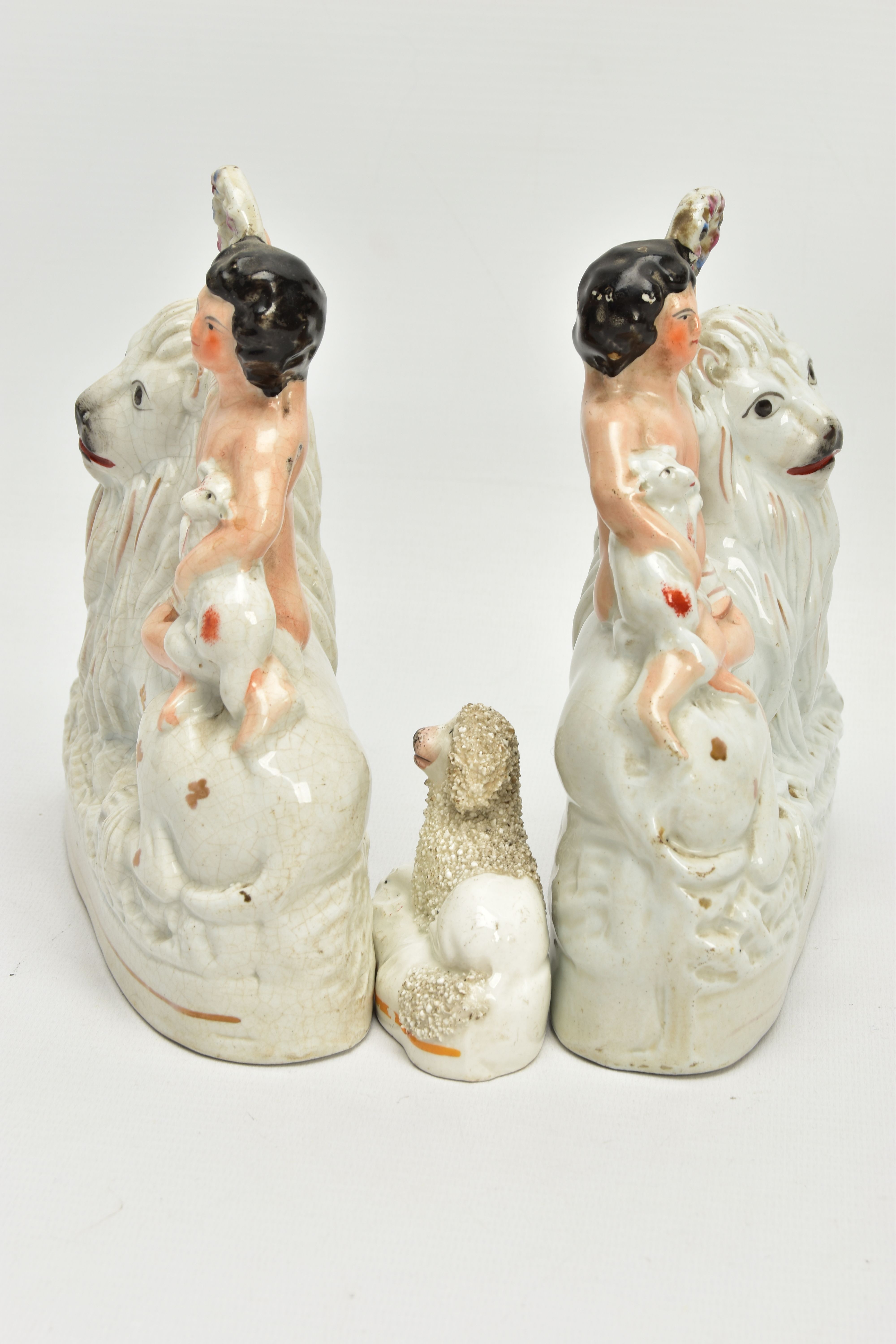 A PAIR OF VICTORIAN STAFFORDSHIRE POTTERY FIGURE GROUPS, modelled as a naked boy holding a garland a - Image 5 of 8