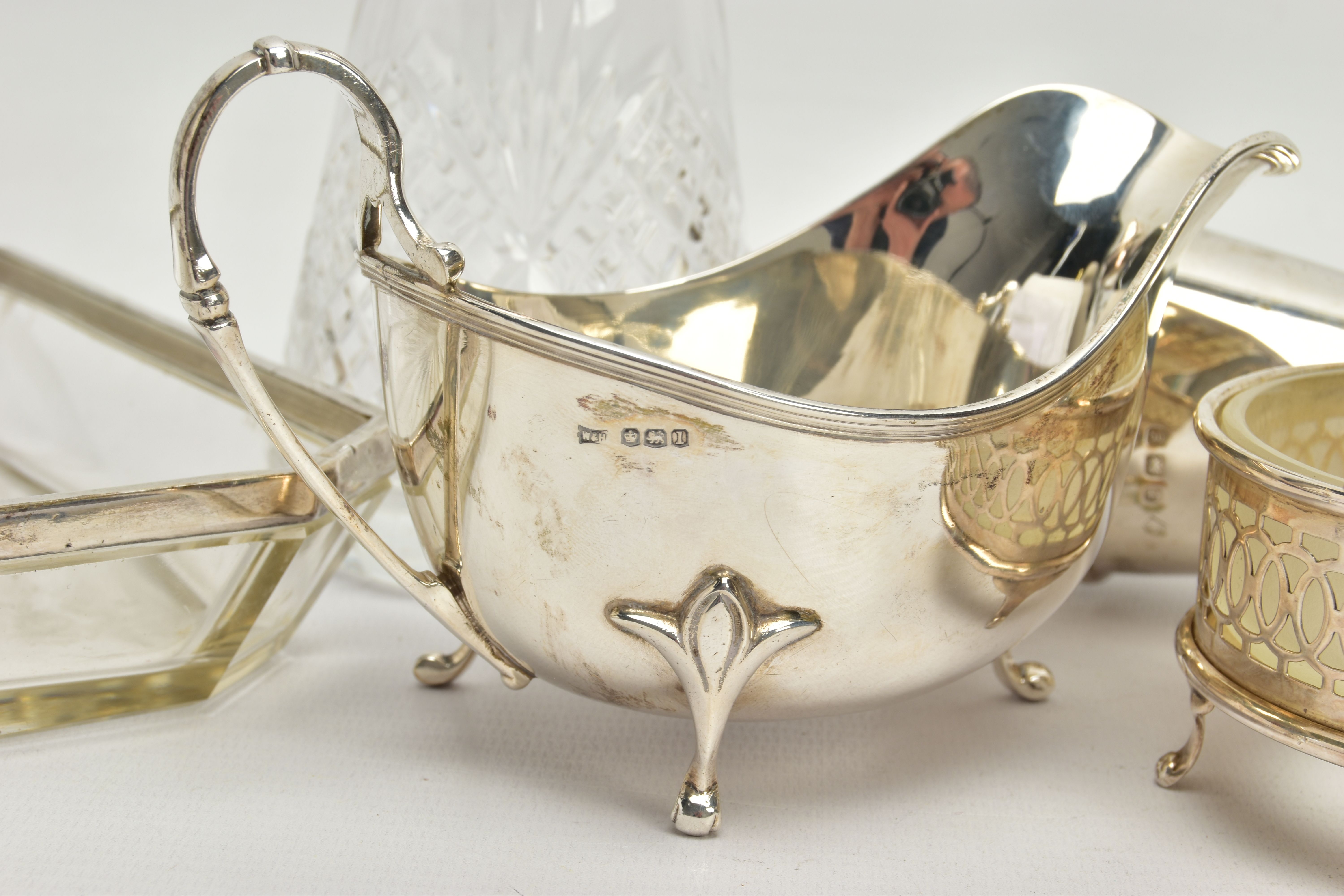 A PARCEL OF SILVER AND SILVER MOUNTED ITEMS, comprising a George V sauce boat, on three cabriole - Image 9 of 15