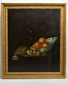 A 20TH CENTURY STILL LIFE STUDY OF FRUIT AFTER WILLEM KALF, depicting oranges, lemons in a delft