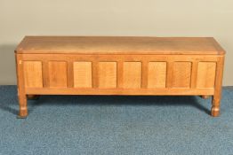 ROBERT 'MOUSEMAN' THOMPSON OF KILBURN, AN OAK PANELLED BLANKET CHEST, with a rectangular adzed