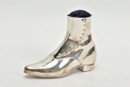 A LATE VICTORIAN SILVER PIN CUSHION IN THE FORM OF A LADIES BOOT, blue velvet cushion, makers