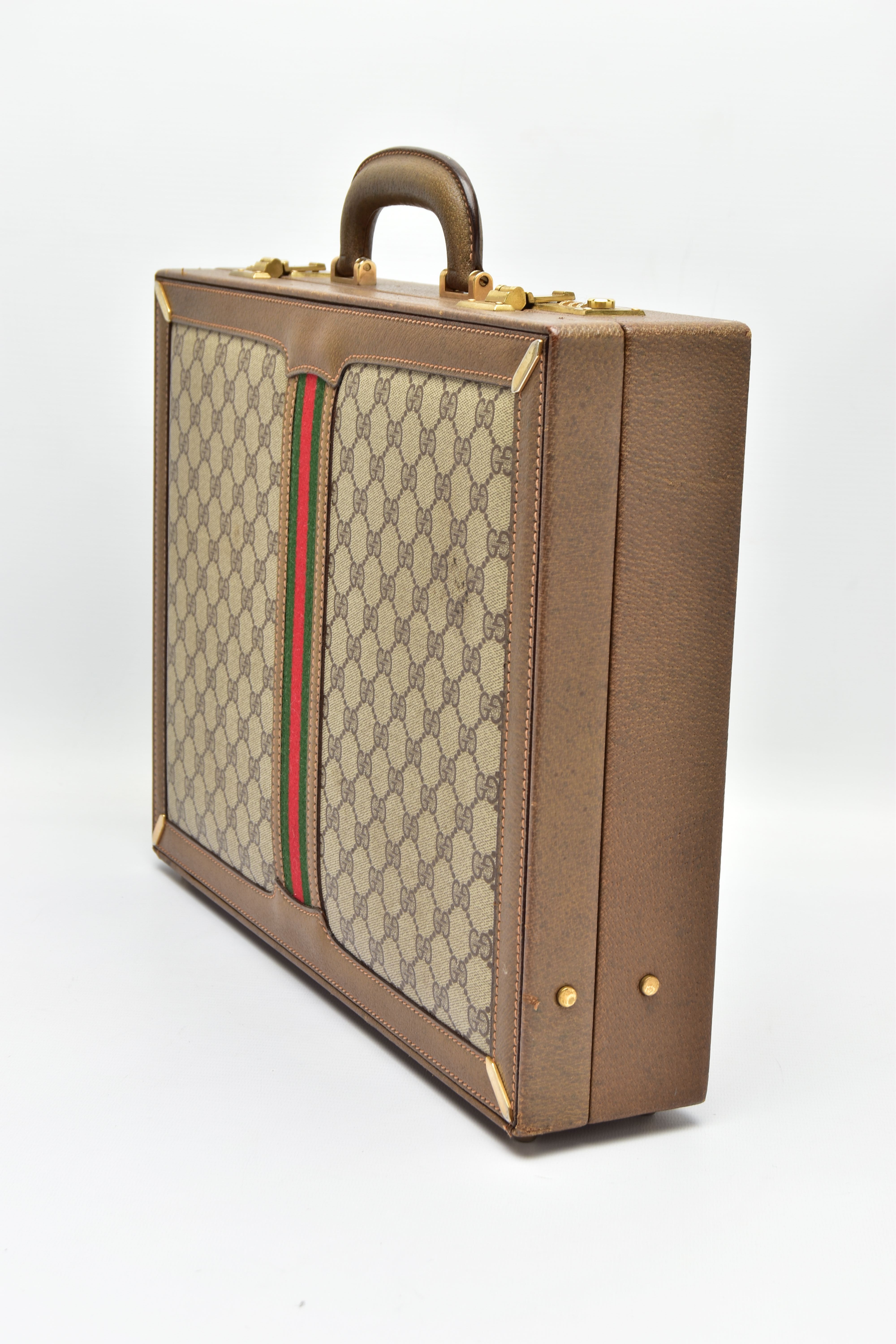 A VINTAGE GUCCI BRIEFCASE WITH GREEN LEATHER TRIM, the front and back vinyl panels with Gucci - Image 3 of 20