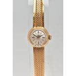 A MID TWENTEITH CENTURY OMEGA LADIES GOLD WRISTWATCH, a small round case measuring 15.4mm in