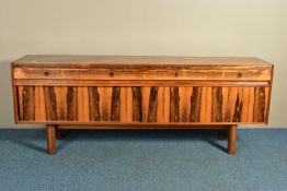 ROBERT HERITAGE (BRITISH 1927-) FOR ARCHIE SHINE, A 1960'S ROSEWOOD SIDEBOARD, the four drawers with