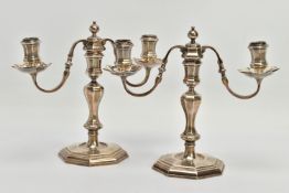 A PAIR OF GEORGE I STYLE SILVER CANDLESTICKS OF OCTAGONAL FORM, baluster stems, stepped octagonal