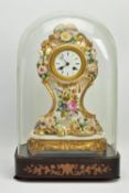 A LATE 19TH CENTURY FRENCH PORCELAIN CASED MANTEL CLOCK OF ROCOCO STYLE, enamel dial with blue Roman
