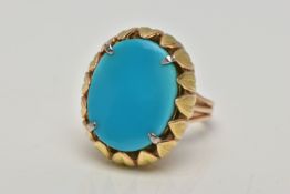 A MID 20TH CENTURY TURQUOISE YELLOW METAL COCKTAIL RING, set with a principal oval flat polished top