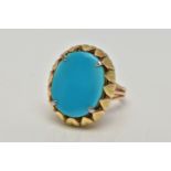 A MID 20TH CENTURY TURQUOISE YELLOW METAL COCKTAIL RING, set with a principal oval flat polished top