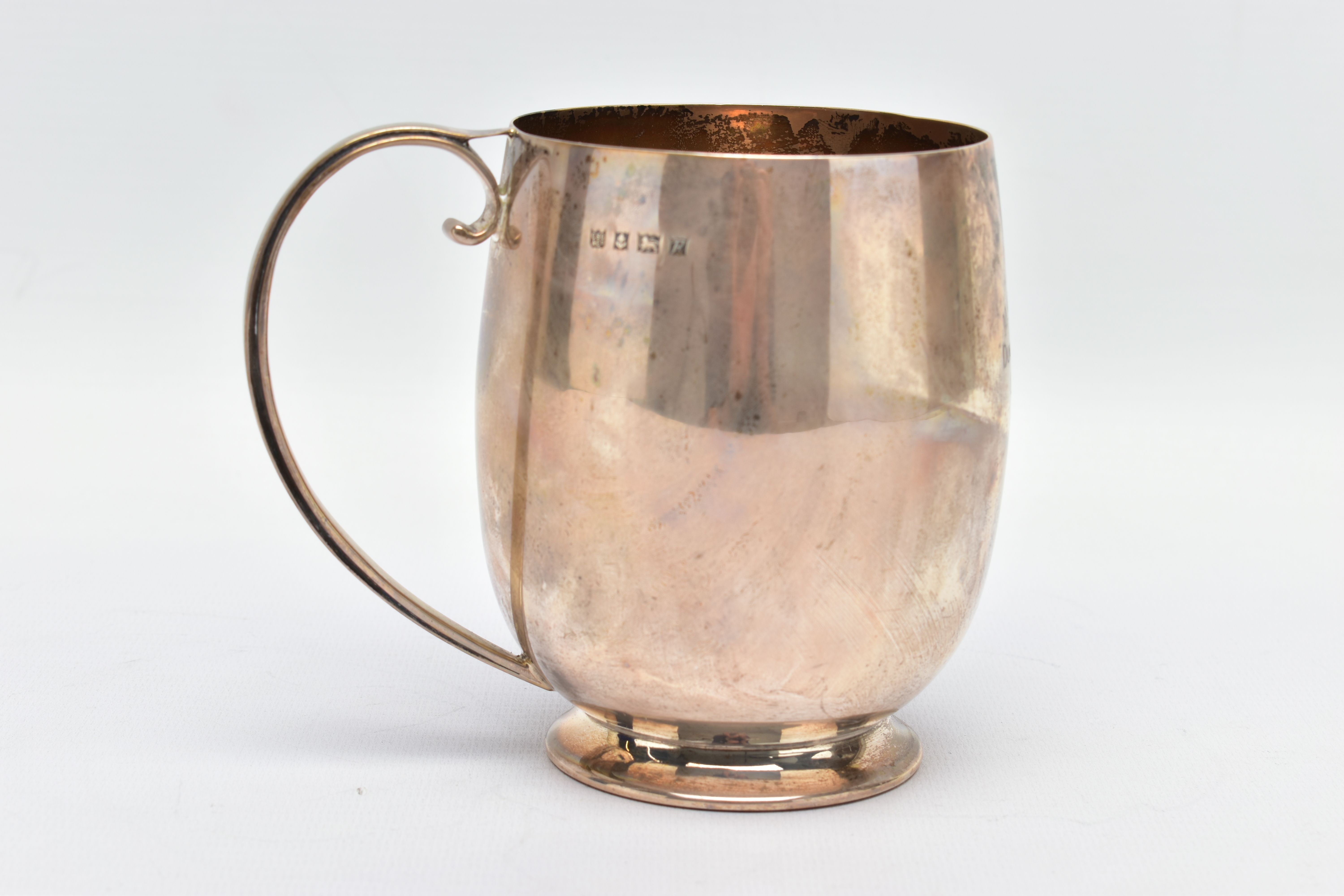 AN ELIZABETH II SILVER MUG, a bell shaped mug with a scrolled handle and skirted foot, engraved 'M.C - Image 3 of 7