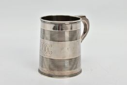 A GEORGE III SILVER CHRISTENING MUG OF TAPERED CYLINDRICAL FORM WITH REEDED BANDS, engraved initials