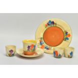 SIX PIECES OF CLARICE CLIFF AUTUMN CROCUS PATTERN ITEMS, comprising three egg cups with Bizarre