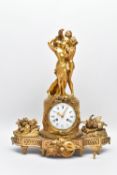 A LATE 19TH CENTURY FRENCH GILT BRASS FIGURAL MANTEL CLOCK BY JACQUIER, surmounted by the three