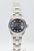 AN 'ROLEX' OYSTER PERPETUAL DATEJUST 26 WRISTWATCH, model number 69174, serial number E638376,