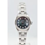 AN 'ROLEX' OYSTER PERPETUAL DATEJUST 26 WRISTWATCH, model number 69174, serial number E638376,