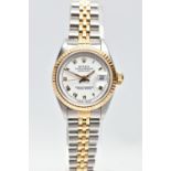 A ROLEX DATEJUST WRISTWATCH, the white dial with gold tone luminescent Roman Numerals, gold tone