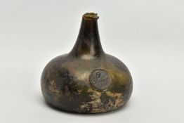 A QUEEN ANNE PERIOD SEALED AND DATED ONION OLIVE GREEN GLASS WINE BOTTLE, damaged rim and neck,