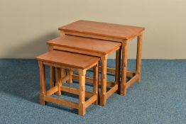 ROBERT 'MOUSEMAN' THOMPSON OF KILBURN, AN OAK RECTANGULAR NEST OF THREE TABLES, adzed top to each