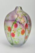 PETER LAYTON (BRITISH 1937) AN IRIDESCENT OVOID SHAPED GLASS VASE, decorated with berries and