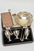 A LATE VICTORIAN SILVER HEART SHAPED BON BON DISH, THREE PAIRS OF SUGAR TONGS AND CASED PART