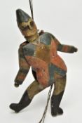 FOLK ART, a 19th century polychrome painted pine Jumping Jack Harlequin toy, carved and decorated to