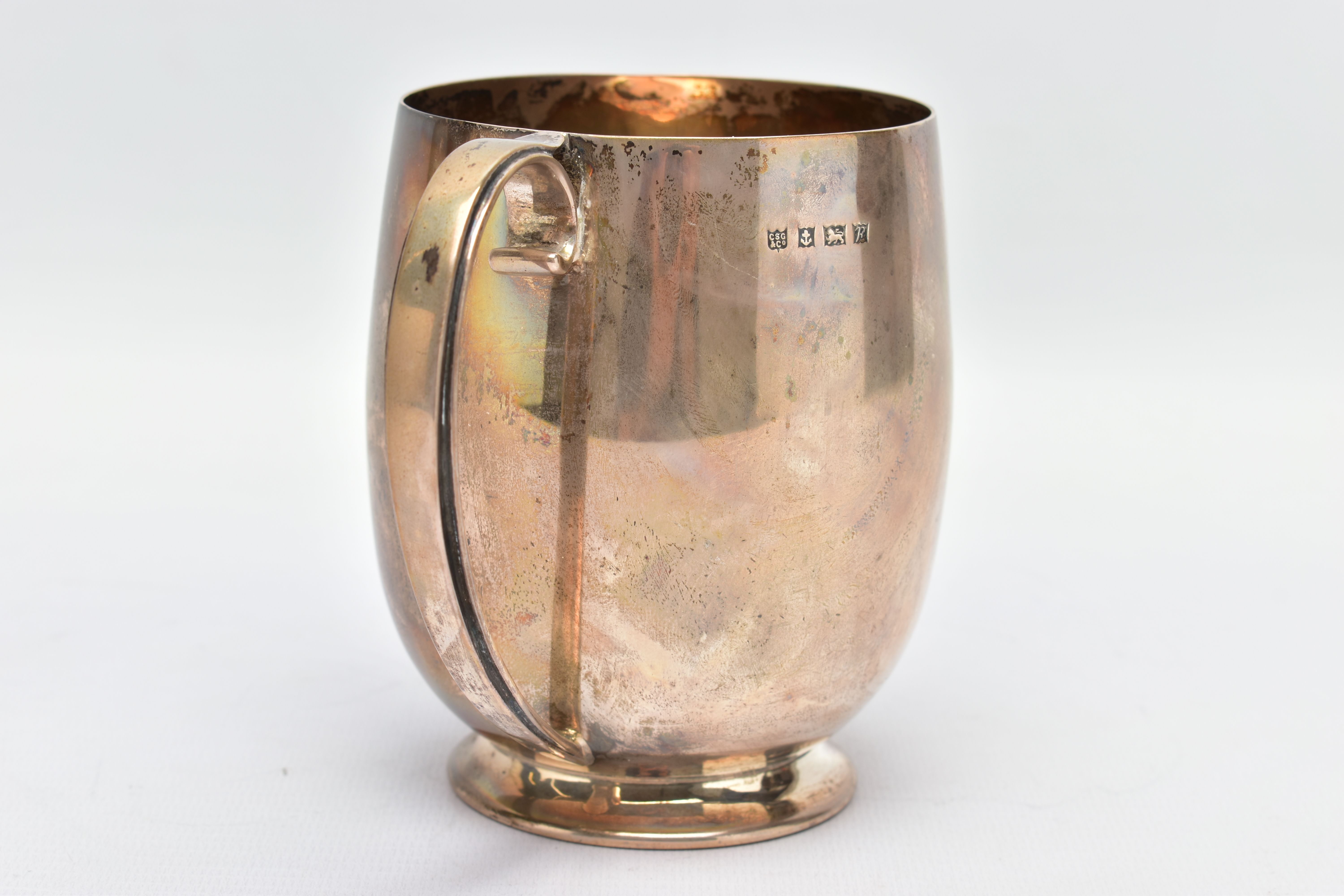 AN ELIZABETH II SILVER MUG, a bell shaped mug with a scrolled handle and skirted foot, engraved 'M.C - Image 4 of 7