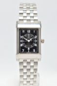 AN ETERNA 'ETERNAMATIC' WRISTWATCH, the rectangular black dial with luminescent Arabic numerals,