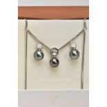 A MODERN TAHITIAN PEARL AND DIAMOND PENDANT AND EARRING SET, pendant designed as a single