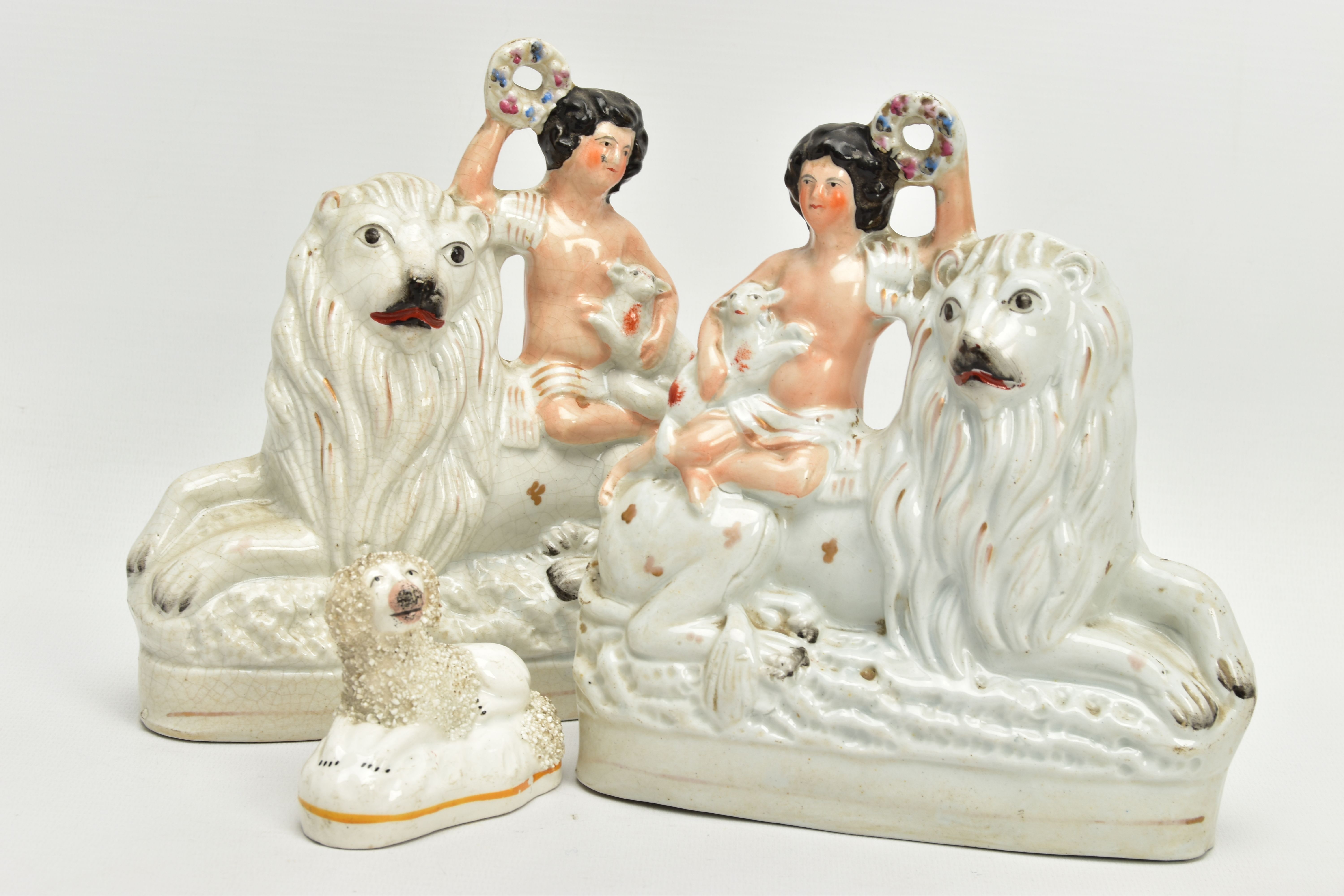 A PAIR OF VICTORIAN STAFFORDSHIRE POTTERY FIGURE GROUPS, modelled as a naked boy holding a garland a - Image 3 of 8