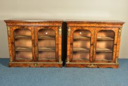 A PAIR OF 19TH CENTURY FRENCH BURR WALNUT AND MARQUETRY INLAID BOOKCASES, the double glazed doors