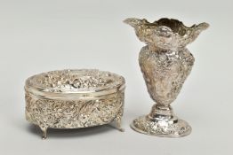 AN EDWARDIAN SILVER OVAL TRINKET BOX WITH HINGED COVER AND A LATE VICTORIAN SILVER VASE, the trinket