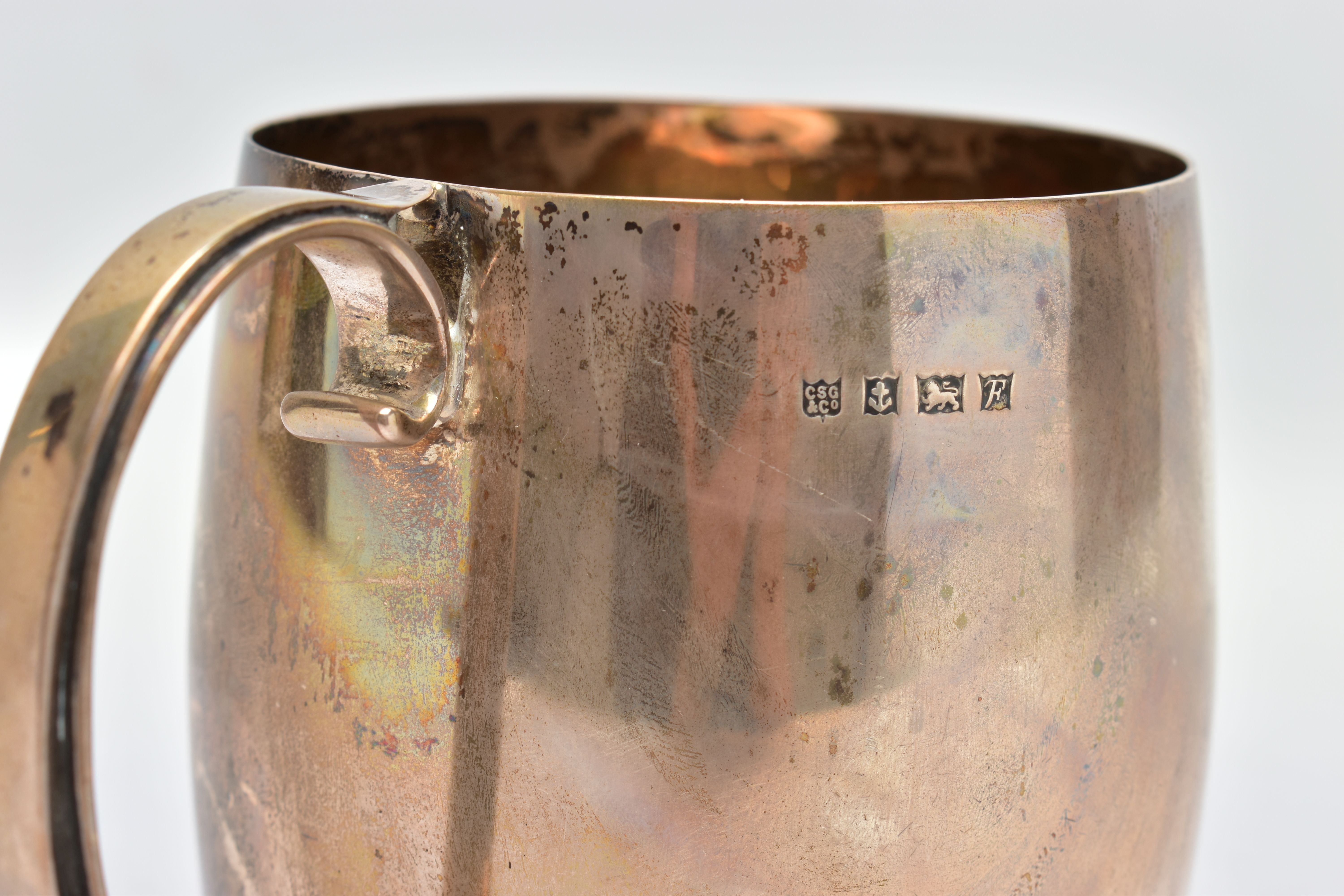 AN ELIZABETH II SILVER MUG, a bell shaped mug with a scrolled handle and skirted foot, engraved 'M.C - Image 5 of 7