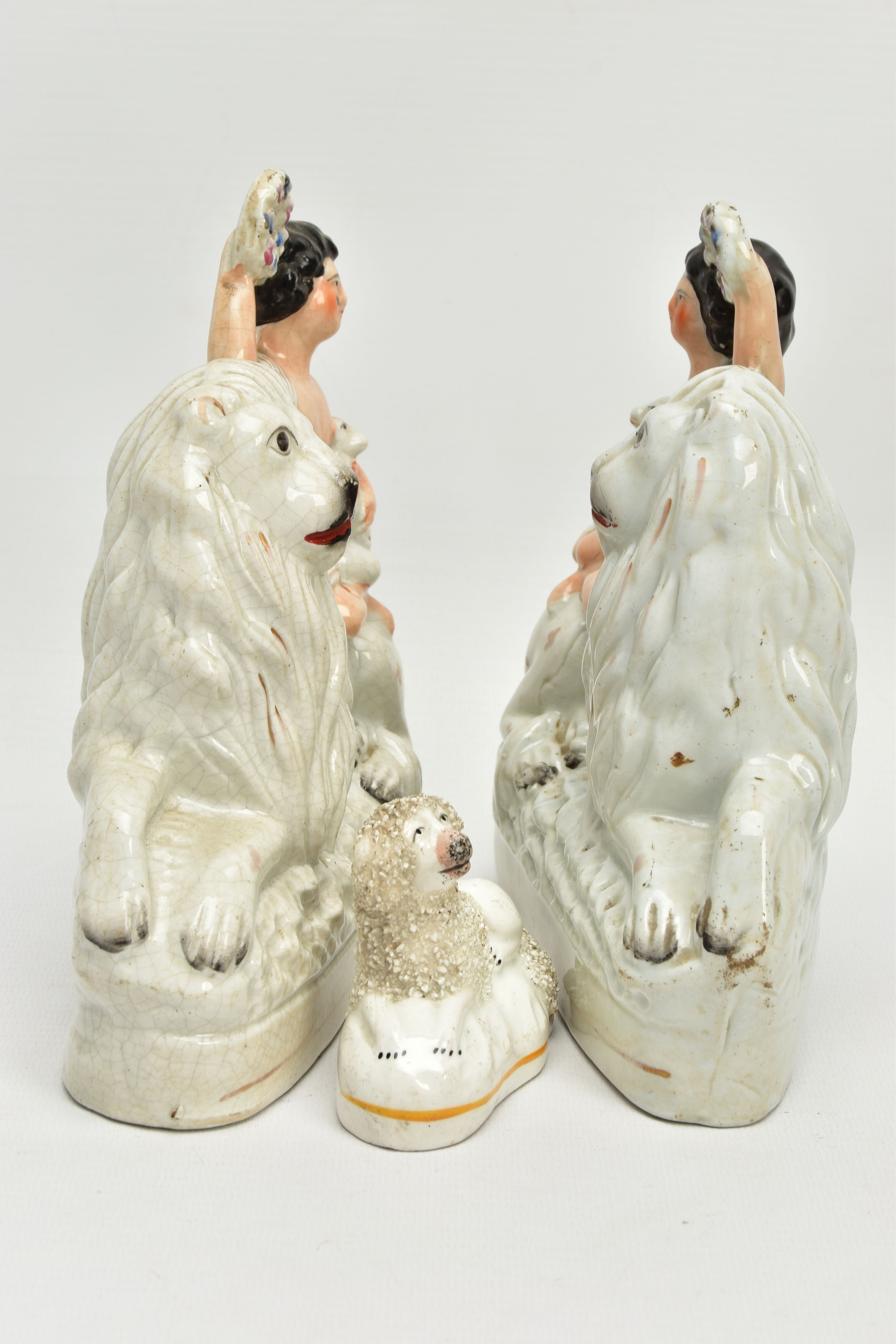 A PAIR OF VICTORIAN STAFFORDSHIRE POTTERY FIGURE GROUPS, modelled as a naked boy holding a garland a - Image 4 of 8