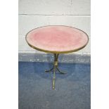 AN EARLY 20TH CENTURY BRASS CIRCULAR BAMBOO EFFECT SIDE TABLE, with a pink baize top surface,