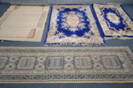 TWO WOOLLEN CHINESE RUG, with a dark blue field, largest rug 178cm x 124cm, a woollen carpet runner,