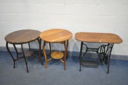 A SINGER TREDLE SEWING MACHINE BASE, with a stained oak top, along with two centre tables (