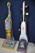 A DYSON DCO4 vacuum cleaner along with a Bissell 37Y8-E carpet cleaner (both PAT pass and