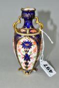 A ROYAL CROWN DERBY IMARI SMALL TWIN HANDLED BALUSTER VASE, decorated in the 1128 pattern, date