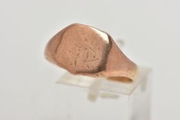 A ROSE GOLD TONE SIGNET RING, shield shape signet with worn engraved initials, misshapen shank