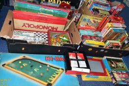 FOUR BOXES OF VINTAGE TOYS, BOARD GAMES AND JIGSAW PUZZLES ETC, to include a boxed Kay Hi-Ball