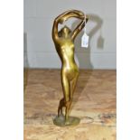 A BRONZED ART DECO STYLE FIGURE, cast as a naked woman, height 31cm