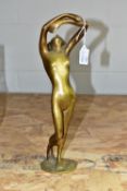 A BRONZED ART DECO STYLE FIGURE, cast as a naked woman, height 31cm