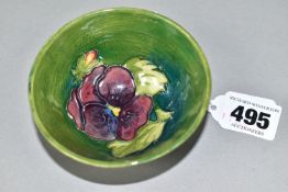 A MOORCROFT POTTERY SMALL FOOTED BOWL, of conical form, in Pansy pattern on a turquoise/green