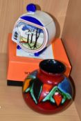 A BOXED WEDGWOOD CLARICE CLIFF COLLECTION PRESERVE POT AND A POOLE POTTERY VASE, the circular